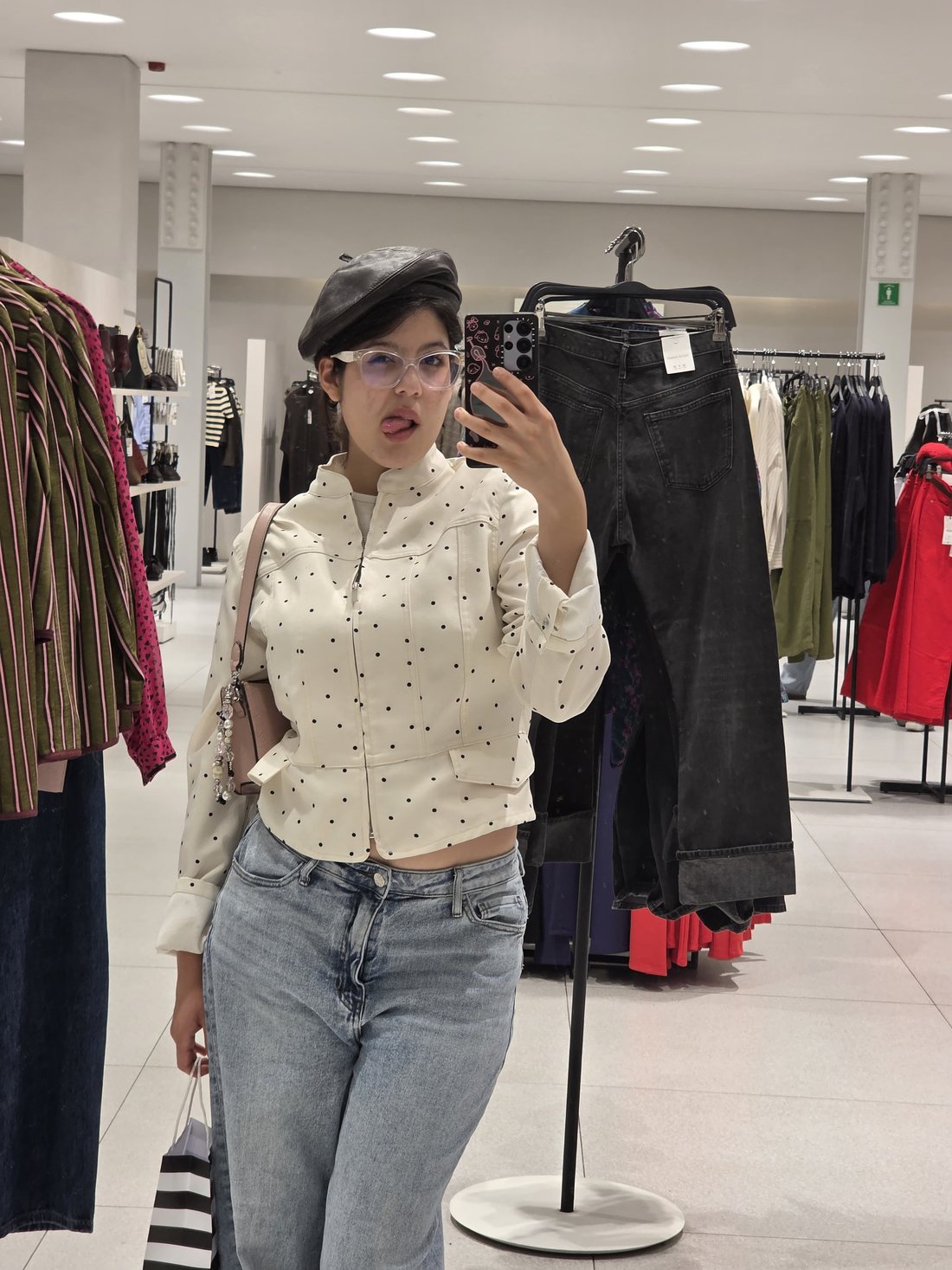 Mirror selfie in a clothing store